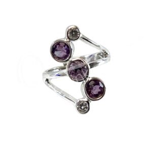 STERLING SILVER - RING, ADJUSTABLE 3 FACETED AMETHYSTS & 2 ZIRCONS 0.75"W