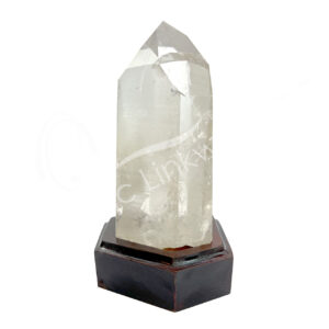 Crystal Quartz Obelisk with one Rough Side and Others Polished on Wood Base