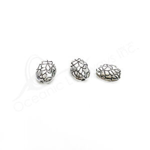 (CLOSE OUT) BEADS - METAL OVAL WITH DESIGN (PK 26) 1 CM L X 8 MM W