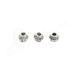 (CLOSE OUT) BEADS - METAL SPACER WITH ROW OF DOTS (PK 30) 7 MM D X 6 MM T