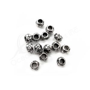 (CLOSE OUT) BEADS - METAL FLOWER EMBOSSED TUBE (PK 50) 9 MM D X 6 MM L