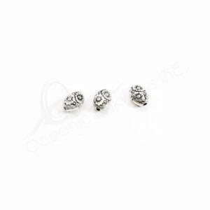 (CLOSE OUT) BEADS - METAL OVAL WITH SUNS (PK 300) 7 MM L X 4 MM T
