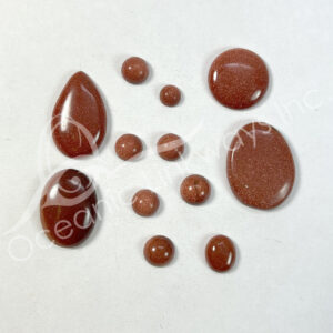 (CLOSE OUT) CABOCHON - GOLDSTONE MIXED SHAPES (PK 3) 7-30 MM L